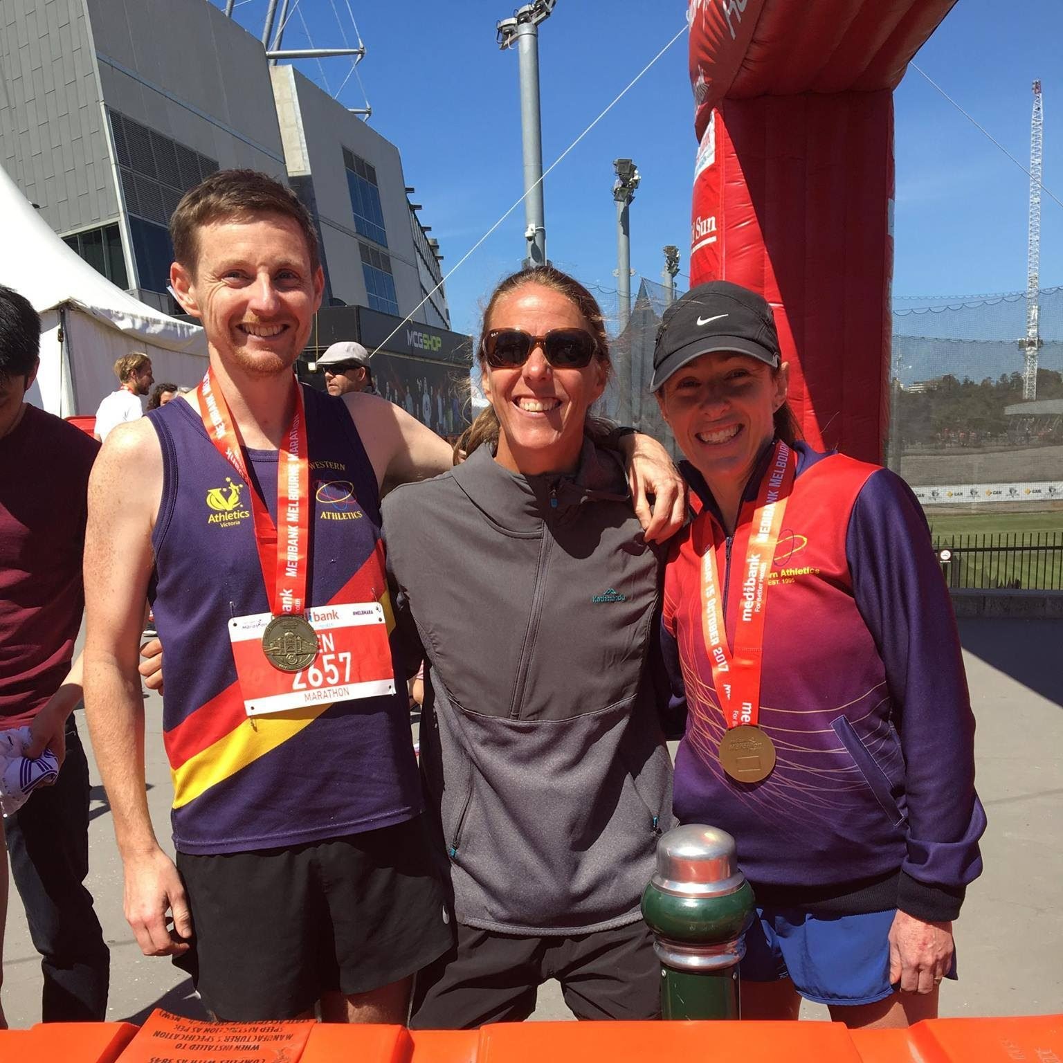 Coach Ben, Chelsea and Sharon after finishing the Melbourne Marathon 2017